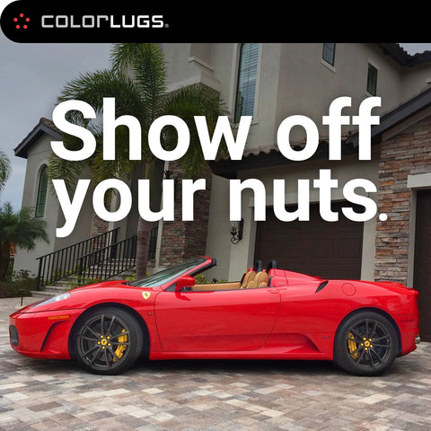 Red convertible car with sleek wheels showcasing Vinyl Lug Nut Covers Black Flexible Fit For 21 To 23 Mm Lug Nuts Pack Of 25