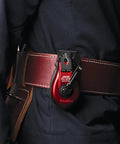 Compact Chalk Line Marker with Extra Bold 1.0mm Line clipped on a tool belt, highlighting its durable aluminum case and collapsible handle.