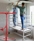 Workers using 16 FT Drywall Lift Panel Rolling Hoist Jack Lifter Sheetrock, Drywall Lifting Construction Tools Caster Wheel