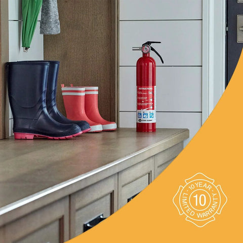 Image of Home Fire Extinguisher UL Rated 1A 10B C Multipurpose Unit With All Metal Construction placed on a countertop next to boots.