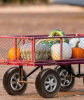 Red garden cart with pumpkins and "✝️ (2-pack) 10" x 2.5" solid rubber tire wheels, 10 inch tire and wheel flat free with 5/8" bearings, 2.1" offset hub replacement wheelbarrow tires- perfect for hand truck, wheelbarrow, garden cart built for smooth motion, steady alignment, and" visible