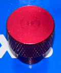 M6 x 18mm Red Knurled Thumb Nut - Closed End - Aluminum, top view on blue background