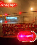 Industrial Red 12V DC LED Warning Light Signal Tower Lamp N-3051 in use on roadside at night, red LED flashing, durable plastic housing.