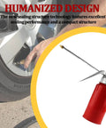 Metal Car Oil Can Pump Oiler With Precision Nozzle Manual Refueling Dispenser next to car wheel