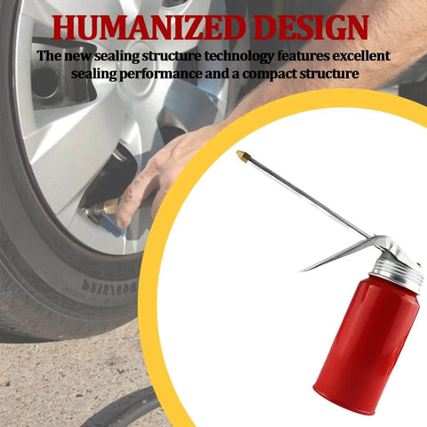Metal Car Oil Can Pump Oiler With Precision Nozzle Manual Refueling Dispenser next to car wheel