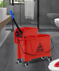 3 Inch Mop Bucket Wheel Replacement Set Of 4 Non Marking TPR Castors For Rubbermaid Models 7570 L2 7571 7580 7581 7582 7583 WaveBrake Compatible Plug And Play Design Durable Non Marking TPR Wheels For Quiet Operation And Easy Replacement on a red mop bucket.