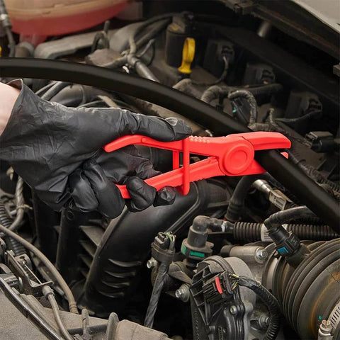 Mechanic using 6 Pack Hose Clamp Pliers Set, 3 Size Plastic Line Pinch Clamps for automotive radiator work.