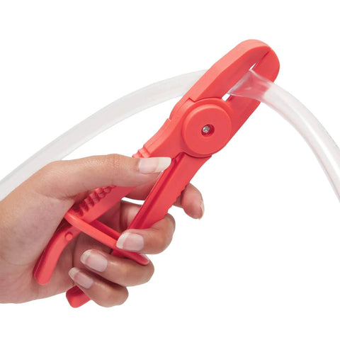 Hand using red nylon pliers to pinch off clear hose, part of Three Pack Hose Pinch Off Pliers In Red Nylon For Automotive Fuel Line Clamps And Brake Radiator And Coolant Hoses Heat Resistant And Nonconductive Clamp Tool Set For Safe Fluid Line Maintenance.