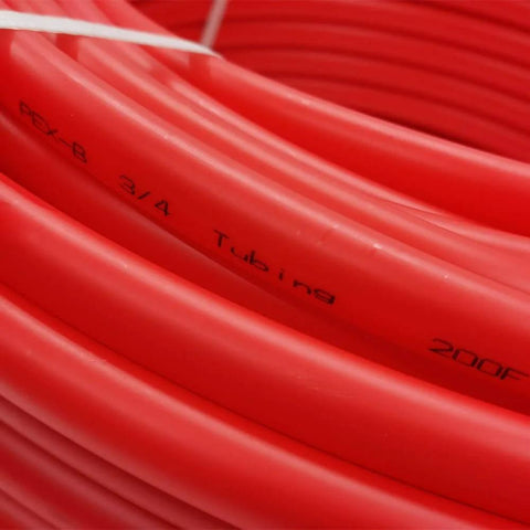 Close-up of red Three Quarter Inch 500 Foot PEX Tube Radiant Floor Heating Red EVOH Coated High Pressure Pipe showing details.