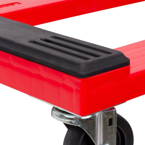 Close-up of red plastic 4-wheel furniture dolly corner with steel-reinforced frame and 4-inch 4-way swivel caster