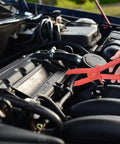 Three Pack Plastic Hose Pinch Off Pliers Set For Automotive Hoses And Fuel Lines Red Plastic Line Clamp Pliers in use on engine