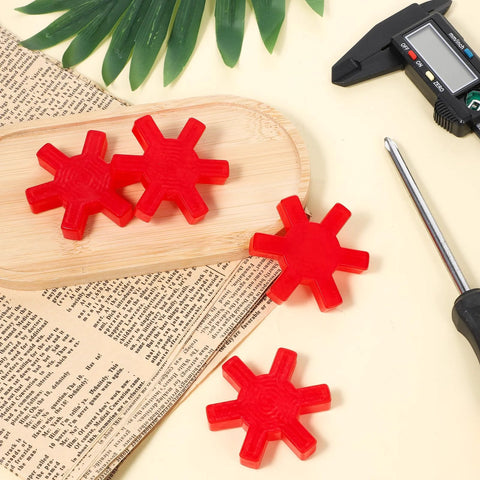 Flexible L095 NBR Rubber Spider Insert Set For L Jaw Couplings, 4 pack in red on a wooden tray with caliper and screwdriver nearby.