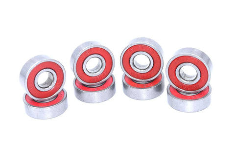 Quiet 608RS Skateboard Bearings Red 100 Pack Low Noise High Precision 8x22x7mm shown in stacks, shiny and red shielded.