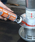 Heavy-Duty High Temp 100 Percent RTV Silicone Sealant Red 10.3 Oz being used on industrial heating element pipe joint