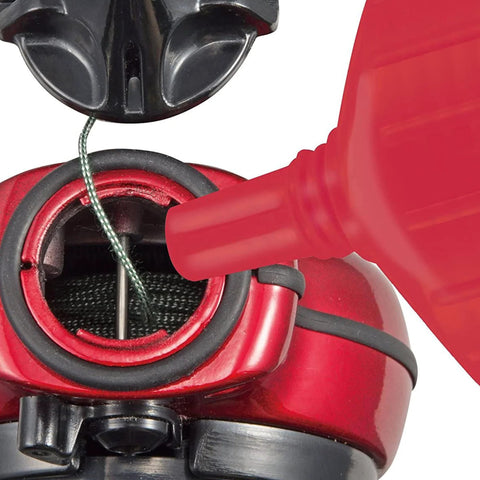 Close-up of Red Ultra Fine Snap Line Chalk 10.5 Ounce Bottle filling nozzle, illustrating precise marking setup for construction.