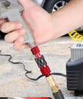 Universal Air Coupler And Plug Kit For Quarter Inch NPT Quick Connect Interchange Compatible With I M Aro And T Type 14 Piece Set With Female And Male Plugs In Red being used in an air system connection.