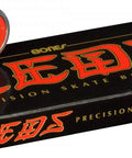 Bones REDS Skateboard Bearings 8 Pack High Performance Precision Bearings with packaging and two bearings displayed