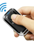 Hand holding a wireless remote for Remote Door Access Control System With 600 Lb Electromagnetic Lock Kit And Z L Bracket.