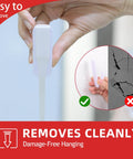 Demonstration of Heavy Duty Removable Double Sided Foam Tape for picture hanging, showing easy removal without wall damage.