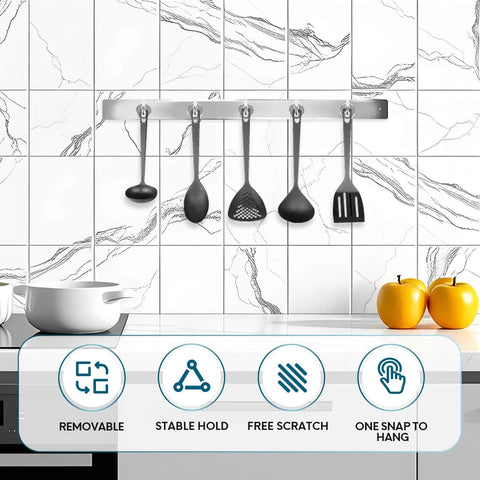 Kitchen holder with hanging utensils against a tiled backsplash, featuring removable, stable hold, free scratch, and one snap to hang features.