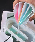 Pouring resin from Resin Art Split Cup Set With Three Compartments Silicone Mixing Cups For Fluid Art And Acrylic Pouring Easy Pour Spout
