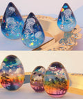 Mini Egg And Waterdrop Silicone Molds Set showing resin jewelry with jellyfish and forest designs