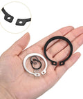Hand holding various sizes of External Retaining Ring Kit, 145 Pieces, 10 Sizes From M5 To M14, 65Mn Carbon Steel Circlip Snap Rings Assortment