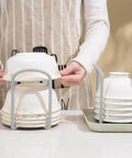 2 Pcs Bowl Rack for Kitchen Cutlery, Retractable Plastic Dish Rack, shown storing stacked bowls on a countertop