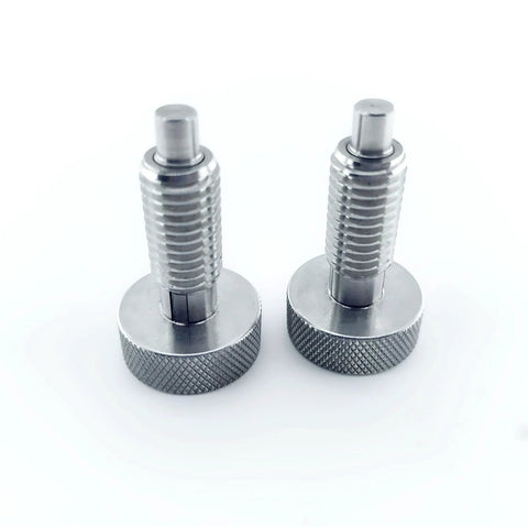Two stainless steel retractable spring plungers with knurled bases, M12x1.75, for industrial equipment