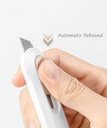 Demonstration of Four Piece Utility Knife Box Cutter Set With Retractable Letter Opener And Cardboard Cutter Razor Knife For Boxes And Packaging, Durable Carbon Steel Blades, Smooth Mechanism, Comfortable Grip For Office And Home Use showing automatic rebound feature.