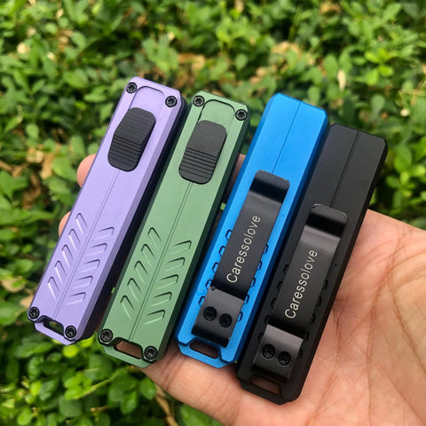 Auto retractable utility knife with push button deployment offers safe, precise cutting, shown in various colors with pocket clip.