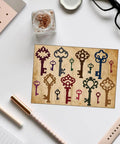 Retro Keys Cutting Dies Set For Scrapbooking And Card Making, Delorigin 16pcs on desk with vintage key designs