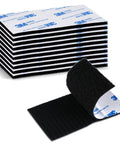Stack of black reusable hook and loop pad set with self adhesive interlocking strips 10 pairs for picture hanging strips fastener.