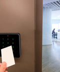 Person using 13.56MHZ RFID Door Access Control With Keypad Waterproof Aluminum Frame Supports 10000 Card Users Includes 5 IC Cards