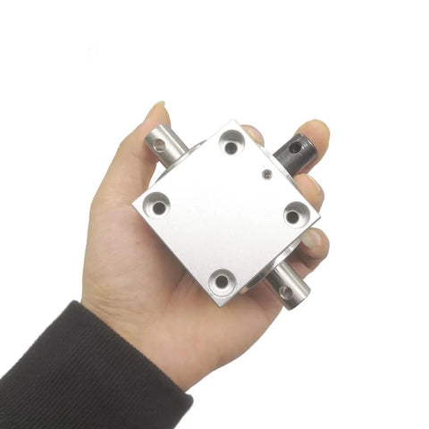 Right Angle Bevel Gearbox 1.5 Module 20 Teeth 90 Degree Drive For DIY CNC in hand, silver metal with 15 mm shaft visible