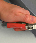 One Quarter Inch 90 Degree Angle Offset Power Groove Drive Adapter 49-22-8510 in use with drill for right angle drilling.