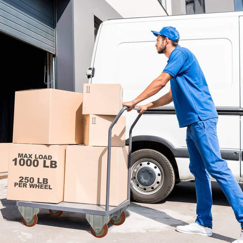 Worker pushing a cart with 8 Pack 3 Inch Rigid Non Swivel Caster With Red Polyurethane Wheels And Top Plate For Straight Line Movement