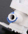 Close-up of RO water pressure regulator and flow regulator for reverse osmosis systems one quarter inch quick connect reducing valve.