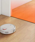 Robot vacuum near magnetic boundary strips for robotic vacuum cleaners, 13 feet of tape markers to create no go zones for older models.