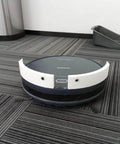 Two Inch Robotic Vacuum Bumper Extender Anti Stuck Guard Keeps Your Cleaner From Getting Stuck Under Couches Beds And Other Low Furniture Fits Most Robot Vacuums Easy Mount Durable Protection For A Hassle Free Clean on a robot vacuum on gray carpet