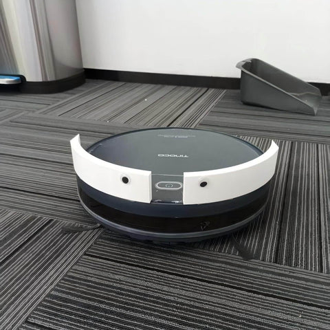 Two Inch Robotic Vacuum Bumper Extender Anti Stuck Guard Keeps Your Cleaner From Getting Stuck Under Couches Beds And Other Low Furniture Fits Most Robot Vacuums Easy Mount Durable Protection For A Hassle Free Clean on a robot vacuum on gray carpet