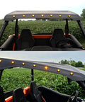 These 3/4 inch round rubber grommets with a waterproof gasket create a tight, weatherproof seal between LED light housings and mounting surfaces, ideal for automotive, trailer, marine, and outdoor LED fixtures in a 50-pack viewed on off-road vehicle.