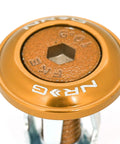 Close-up of Rose Gold Fender Washer Kit M6 1 Thread Bolts and Washers, showing top view of a single washer and bolt.