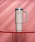 Stay hydrated on the go with this rugged 30 oz insulated stainless steel tumbler featuring FlowState three-position lid, a secure handle, and straw for easy sipping, BPA-free construction, cup holder friendly, in Rose Quartz 2.0