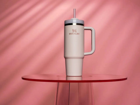 Stay hydrated on the go with this rugged 30 oz insulated stainless steel tumbler featuring FlowState three-position lid, a secure handle, and straw for easy sipping, BPA-free construction, cup holder friendly, in Rose Quartz 2.0