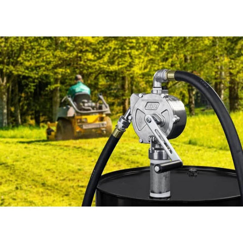 GPI - RP-10-UL Rotary Action Fluid Transfer Hand Pump, 10 Gallons per 100 Revolutions on a fuel drum in a grass field