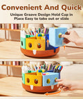 Rotating Art Supplies Organizer With 360 Spin Base and Large Removable Caddy showing a hand adjusting compartments on a desk