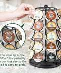 Person using rotating coffee pod carousel for K Cups holds 35 pods spins 360 degrees modern black finish kitchen countertop