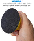 Hand holding Round Hand Sanding Block For 3 Inch Hook And Loop Discs 2 Pack, showing hook-and-loop surface used for woodworking.