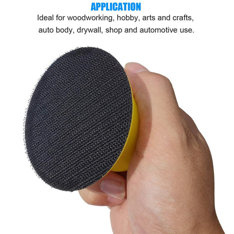 Hand holding Round Hand Sanding Block For 3 Inch Hook And Loop Discs 2 Pack, showing hook-and-loop surface used for woodworking.